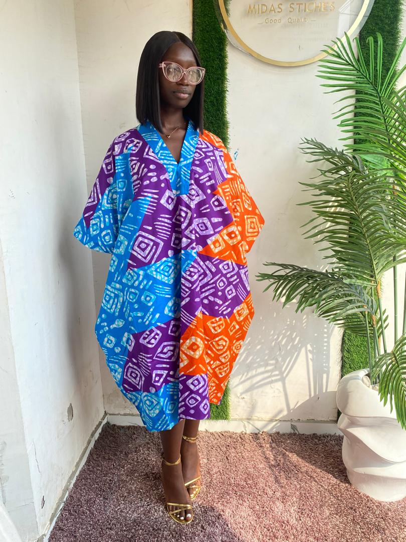 Bloom in Style with Our Floral Short Ankara Gown