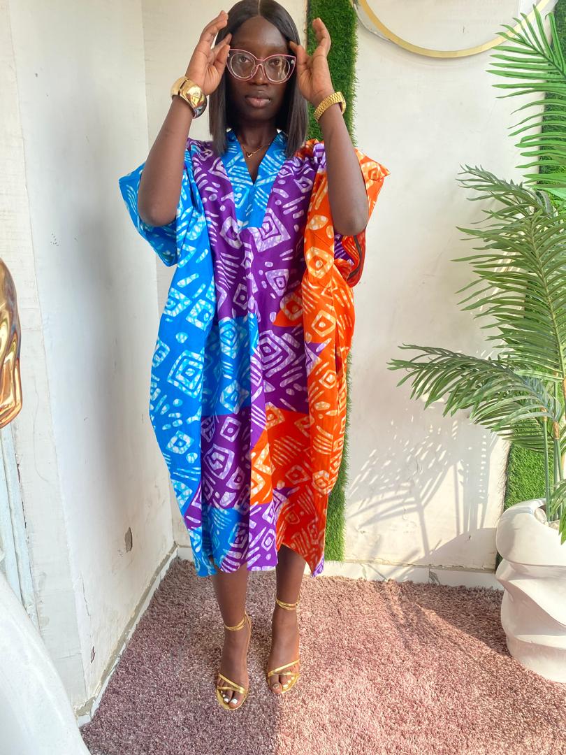 Bloom in Style with Our Floral Short Ankara Gown