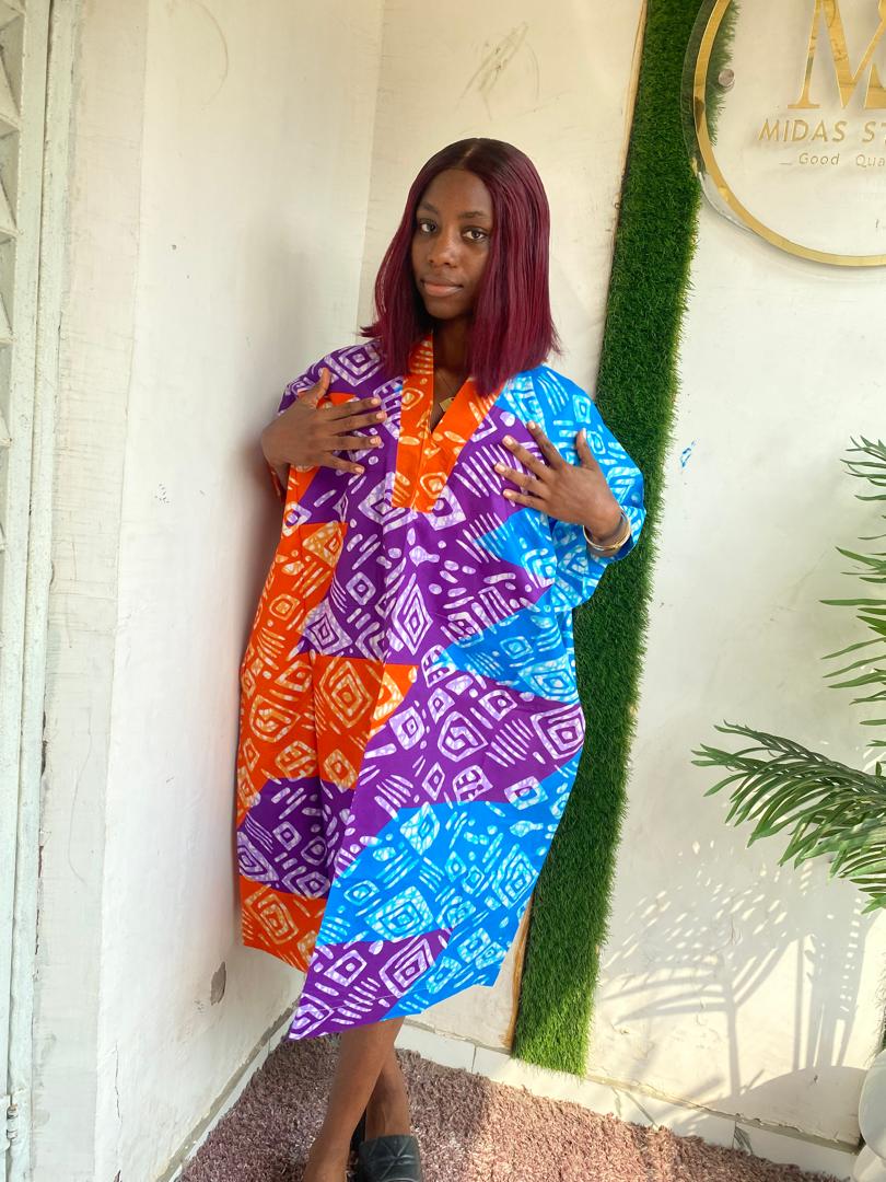 Bloom in Style with Our Floral Short Ankara Gown
